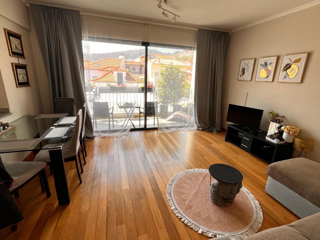 Living room with terrace doors and mountain view